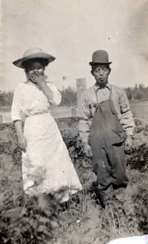 Omadan and wife at work on Ruckle farm