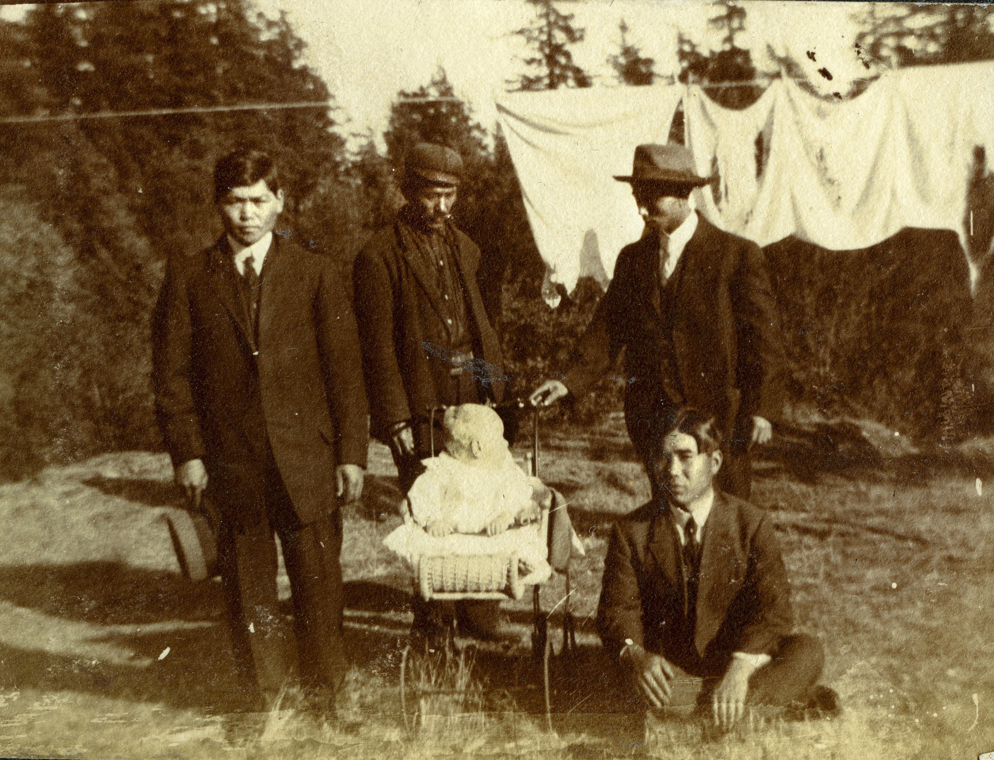 Baby with Monk Farm Workers